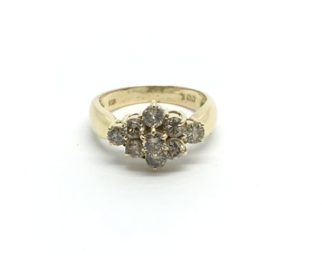 An 18carat gold ring setvwith a pattern of Champagne diamonds total carat weight approximately 1.00 one carat ring size J