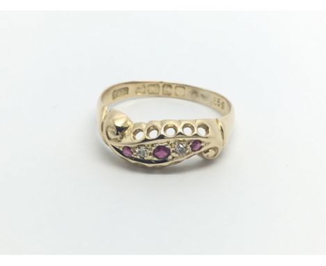 A 9carat gold ring set with a pattern of ruby and diamonds ring size O.