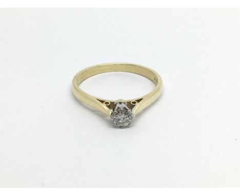 An 18carat gold ring set with a solitaire brilliant cut diamond Approximately 0.20 of a carat ring size N.