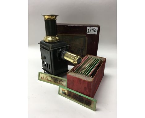 A George Carette Childs magic lantern set.