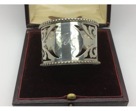 A cased Edwardian silver napkin ring, Birmingham 1905.