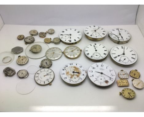 A bag of watch movements to include Chopard and Omega.