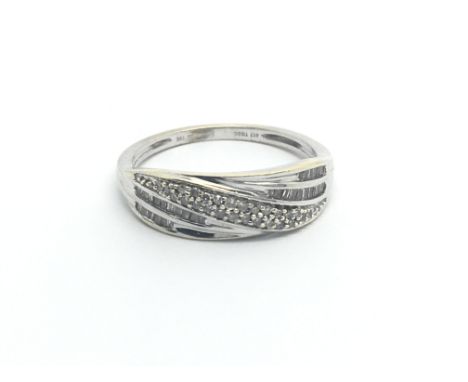 A 9carat white gold ring set with a pattern of diamonds ring size N-O.