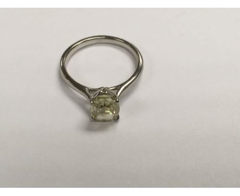 A 18ct white gold 1.75ct yellow diamond solitaire ring, size K.