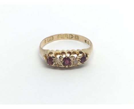 An Vintage 18carat gold ring set with ruby and diamonds. Ring size K. 