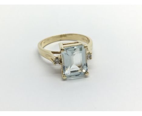 A 14carat gold ring set with a good size aquamarine type stone. ring size O.