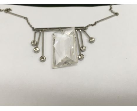 A Art Deco style necklace with drop pendants .