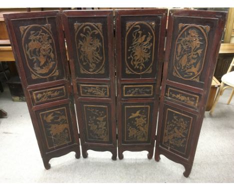 A 20th Century Oriental style four panel folding screen, approx 124cm x 120cm.