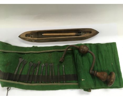 A North Hawick original weaver's loom shuttle and a cabinet maker's brace and tools.
