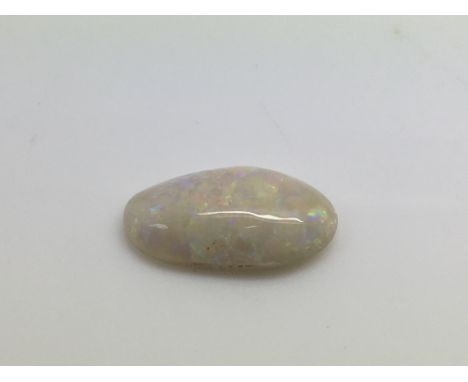 A fine loose natural opal with red and lilac pin fire, approx 16mm x 9mm.