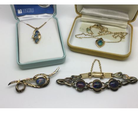 A collection of opal jewellery items.