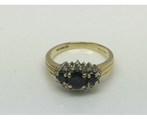 An 18ct gold sapphire and diamond ring, approx 4.2g and approx size M-N.