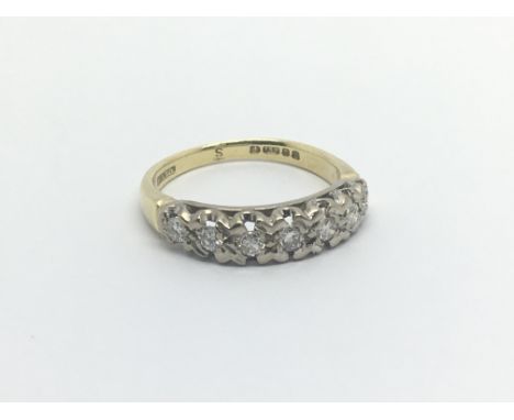 An 18carat gold ring half hoop eternity ring set with a row of diamonds approximately 0.37 of a carat. ring size O-P