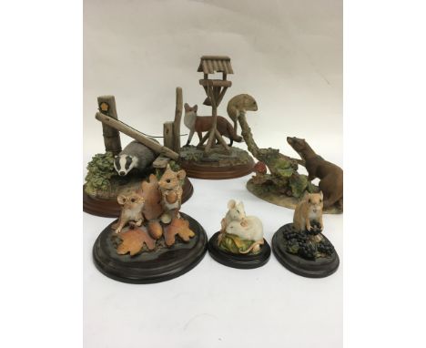 A collection of country artists and border fine art figures