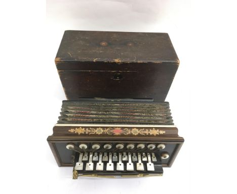 A wooden cased French Flutina accordion with mother of pearl keys and painted decoration.Approx 14x13cm - NO RESERVE