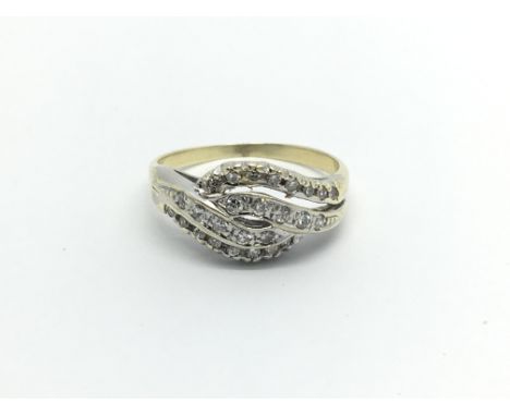 A 14carat gold ring set with a cluster of diamonds ring size O.