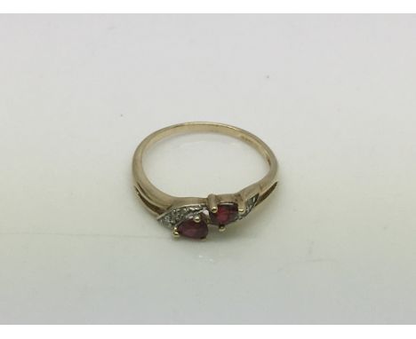 A 9ct gold ruby and diamond ring, approx 1.7g and approx size N.