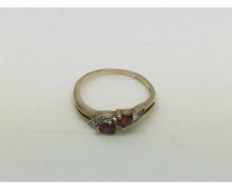 A 9ct gold ruby and diamond ring, approx 1.7g and approx size N.