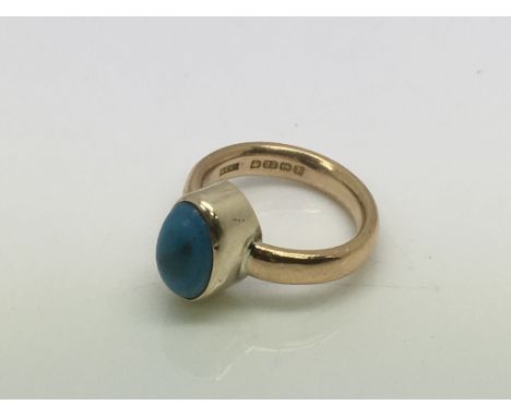 A 22ct gold and turquoise ring, approx 7g and approx size J.