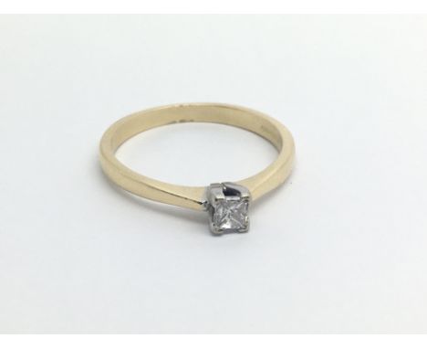 An 18carat gold ring set with a princess cut diamond April 0.25 of a carat  ring size O-P