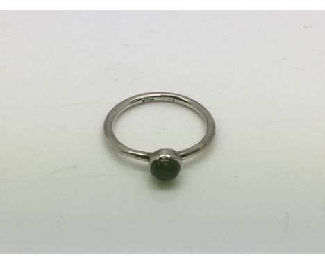 A silver and nephrite jade ring, approx size M-N.