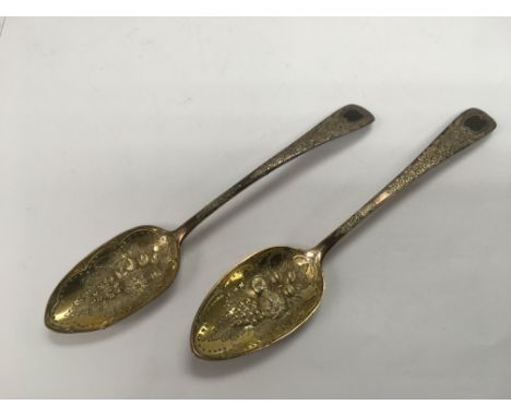 Two Georgian silver berry spoons, London hallmarks.