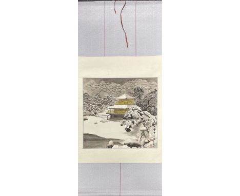 A hand painted Chinese watercolour on paper scroll mounted with silk border of a pagoda in a winter landscape, scroll size 77
