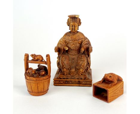 A Chinese carved wooden figure of an Empress ( slightly a/f), H. 10cm. together with two carved fruitwood netsuke.