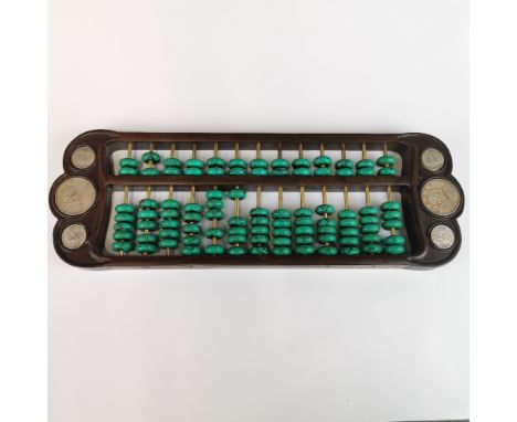 A Chinese wooden abacus, L. 42, W. 15cm.