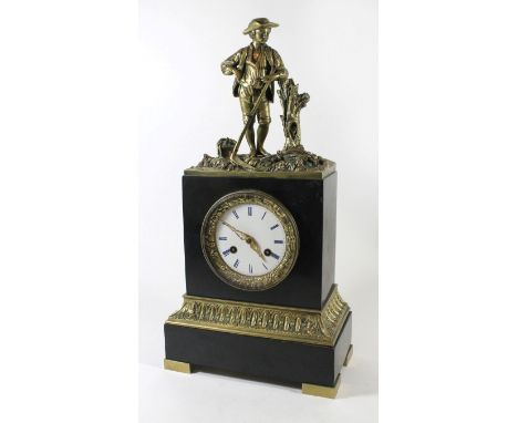 A late 19th Century French figural mantel clockThe circular white enamel dial with Roman numerals and floral mounted bezel, t