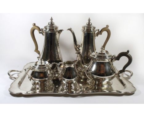 A Queen Elizabeth II silver five piece tea and coffee serviceComprising teapot, coffee pot and hot water jug, all with hinged