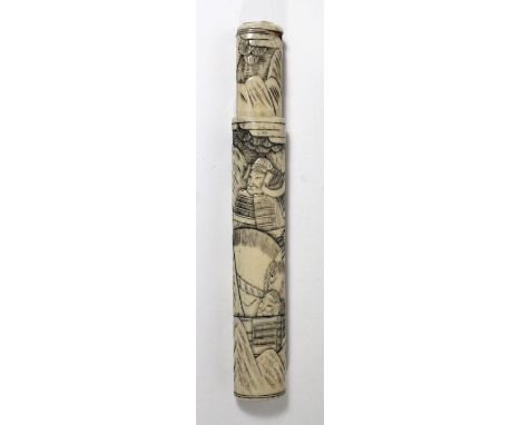 A Japanese carved bone opium pipe caseDecorated with Samurai and village scene, length 21cm. 