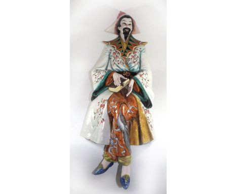 A pair of large 20th Century Italian ceramic figuresOf a seated Oriental couple in flowing floral robes, approx height 100cm.