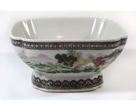 A Chinese Famille Verte porcelain footed bowlPainted with figures in landscape scene, Qianlong seal mark to base, diameter 17