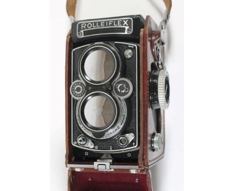 Vintage Camera - Franke and Heidecke Rolleiflex camera  No. 1860049 with Carl Zeiss 1 3:5 F=75mm lens, in brown leather case.