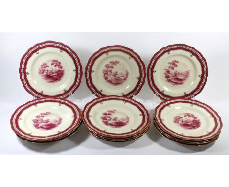 A set of fourteen Copeland Spode cabinet platesEach decorated with puce rural scenes, surrounded by a gilt highlighted border