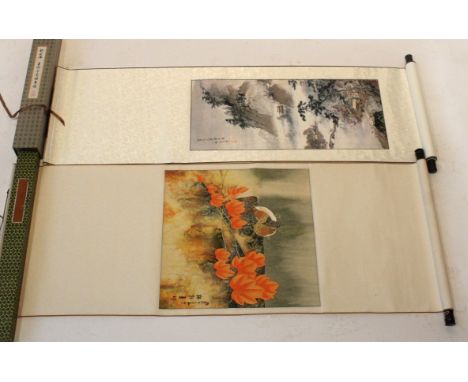 A Chinese hand painted scroll, 20th CenturyDepicting birds amongst leaves, signed, fitted in box together with a printed exam