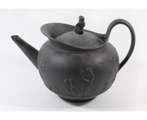 A late 18th/early 19th Century Wedgwood teapot Of circular form, relief decorated with classical maiden and children in lands