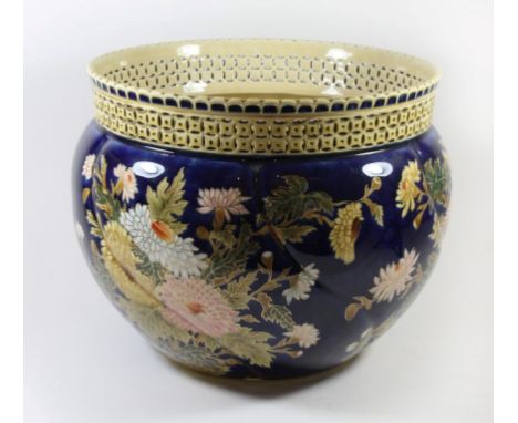 A large Zsolnay Hungarian jardiniereOf circular form, the pierced top rim over a body decorated with sprays of flowers, heigh