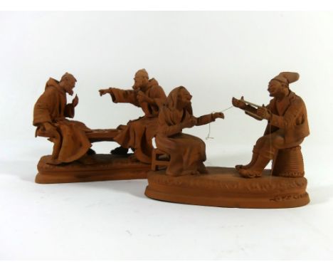Two Italian Grasso terracotta figure groupsFormed as monks playing cards and an elderly couple, impressed marked to base, lar