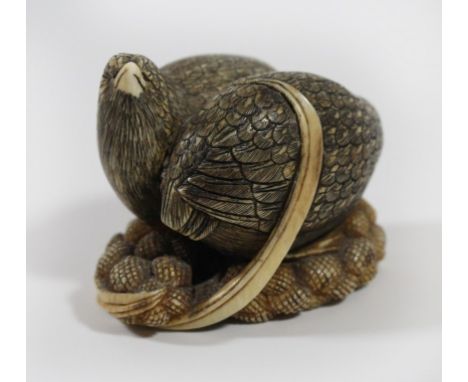 A Japanese carved ivory Netsuke Carved as two quail seated on millet, signed to base, length 4.5cm.ADDITIONAL INFO/CONDITION 