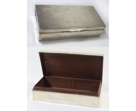 An early to mid 20th Century silver mounted cigar boxOf hinged rectangular with wood lined interior, the lid decorated with e