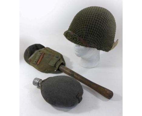 A United States of America GI helmet with date 1944Complete with inner lining and string outer cover, United States of Americ