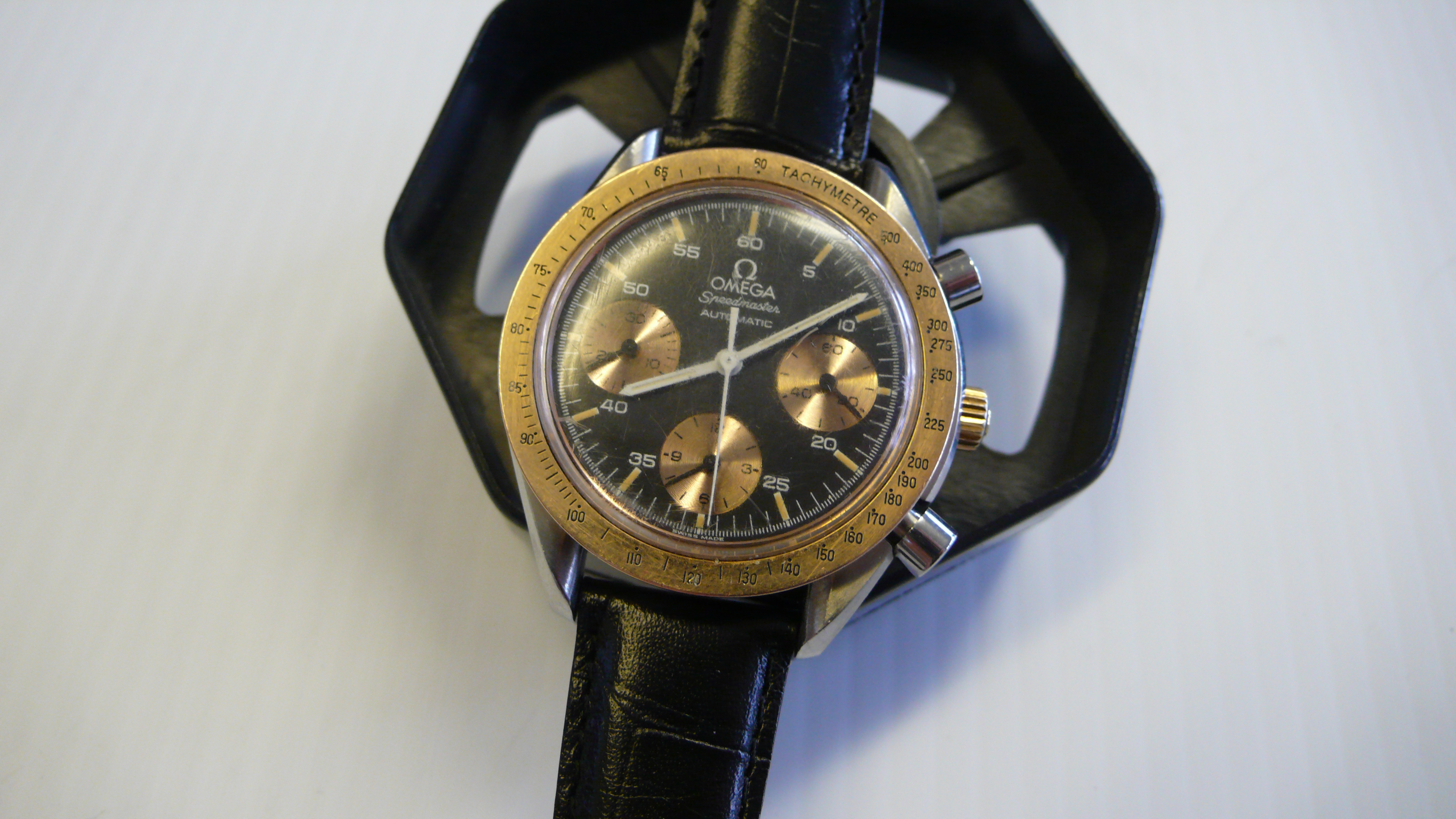 omega speedmaster gold and steel