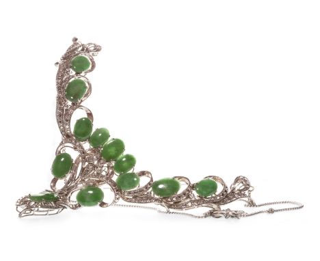 GREEN GEM SET NECKLET, set with oval sections of green hardstone to open work scrolling sections, the main panel 10.5cm wide,