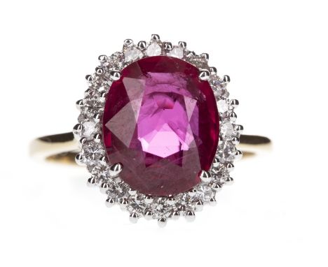 RUBY AND DIAMOND RING, set with a central oval faceted ruby of approximately 3.85 carats with copy of accompanying certificat