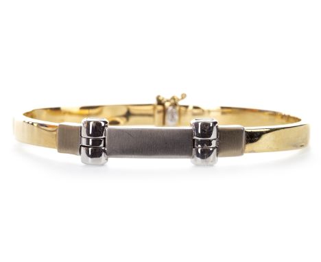 GENTLEMAN'S BI COLOUR BANGLE, of oval form, with central white gold section, misshapen, marked 14k, 18.1gPlease see ‘Importan
