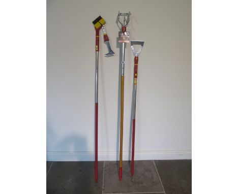 A set of three Wolf garden tools with interchangeable handles 
