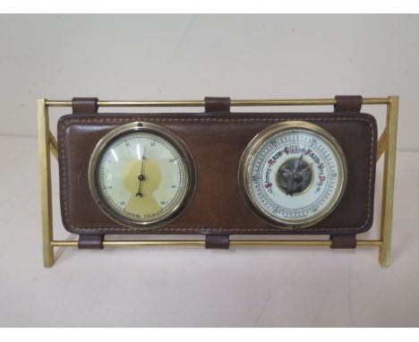 A modern leather mounted brass desk thermometer barometer - in generally good condition - width 26cm 