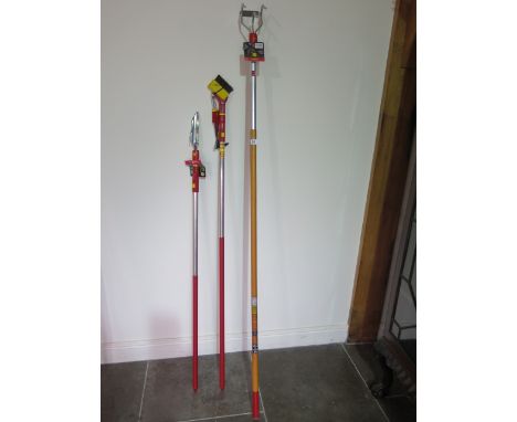 A set of three Wolf garden tools with interchangeable handles 